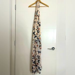 Flowy, floor length dress with a slit. Off the shoulder top portion